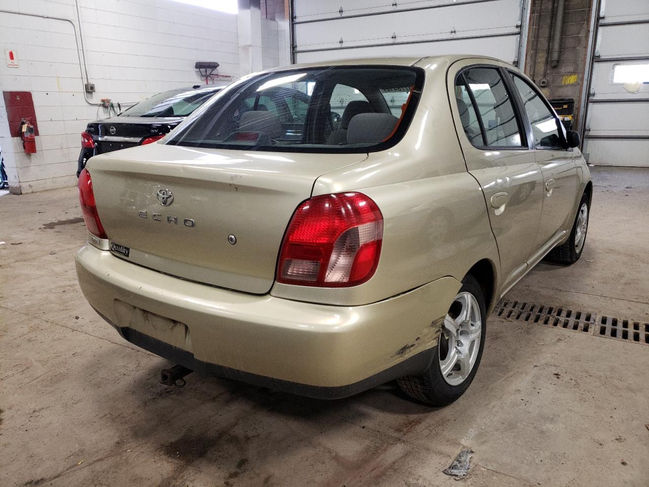 Photo 4 from auction – 2002 TOYOTA ECHO with VIN JTDBT123420246663