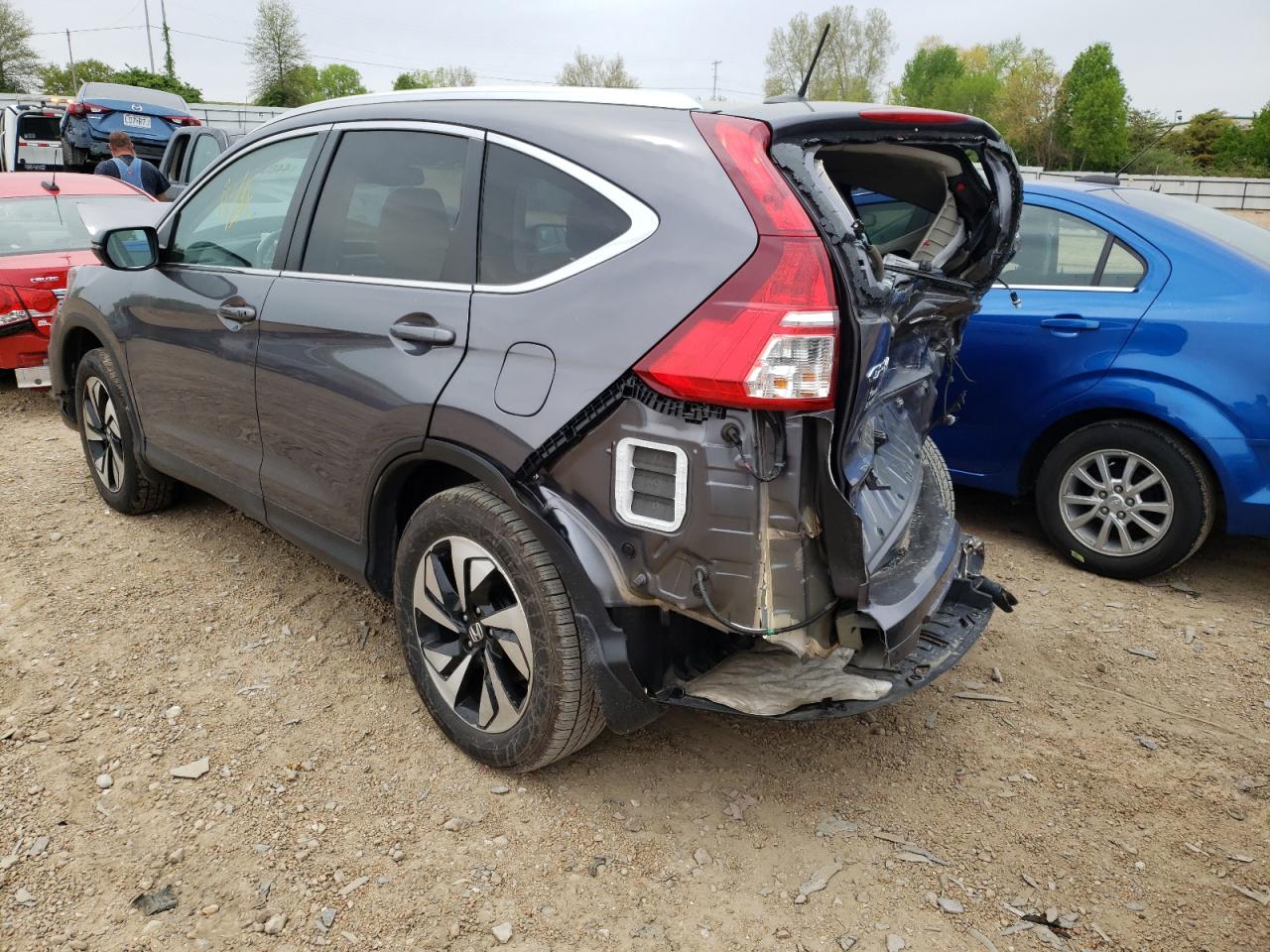 Photo 3 from auction – 2016 HONDA CR-V TOURI with VIN 5J6RM4H90GL013310