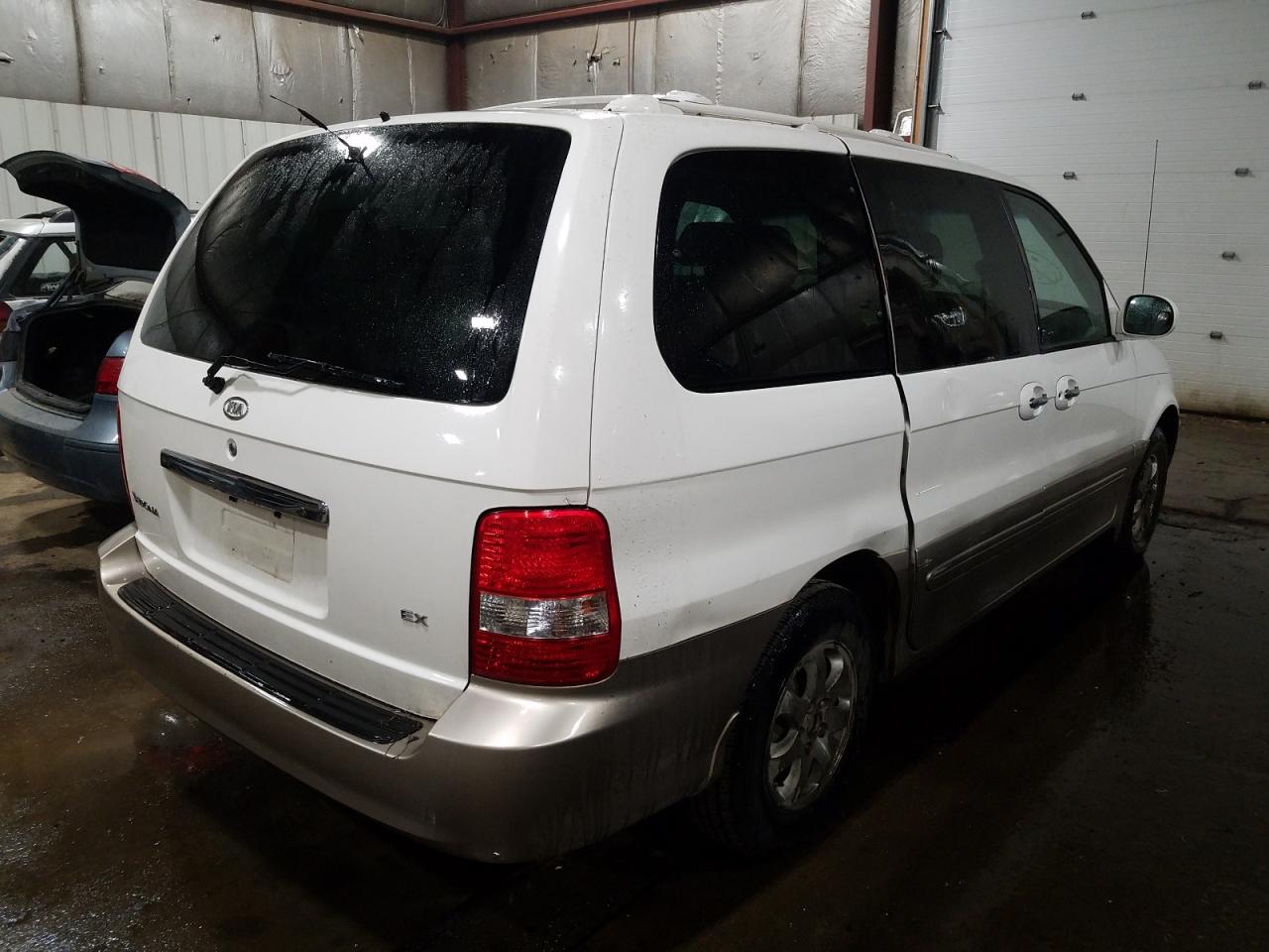 Photo 4 from auction – 2004 KIA SEDONA EX with VIN KNDUP131046575273