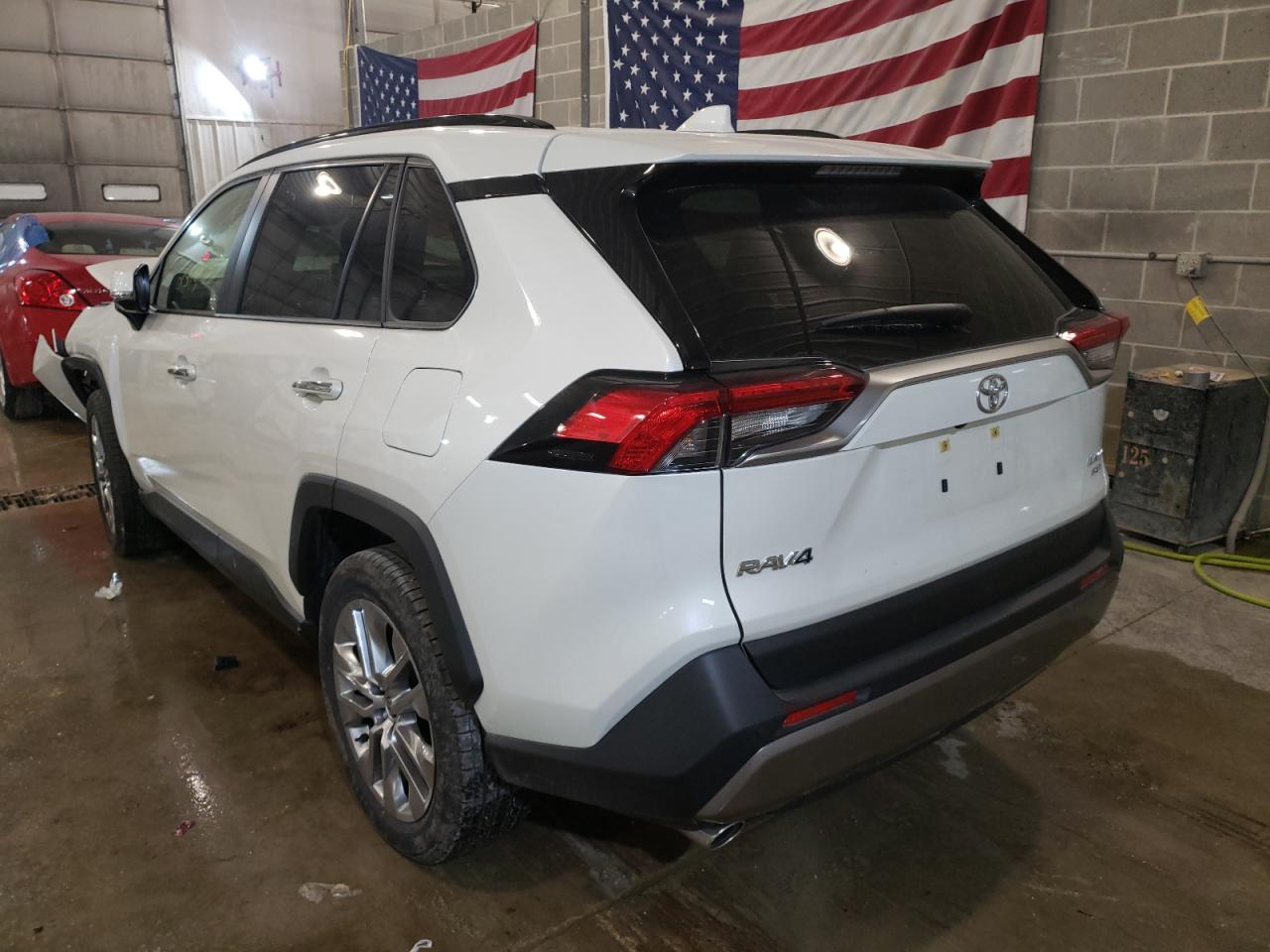 Photo 3 from auction – 2022 TOYOTA RAV4 LTD with VIN JTMN1RFV1ND086011