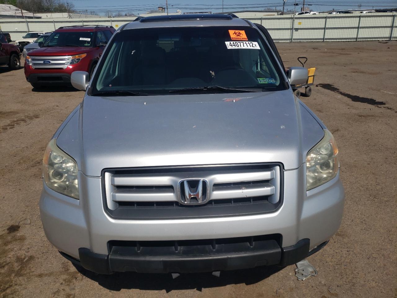 Photo 7 from auction – 2006 HONDA PILOT EX with VIN 2HKYF18556H531486