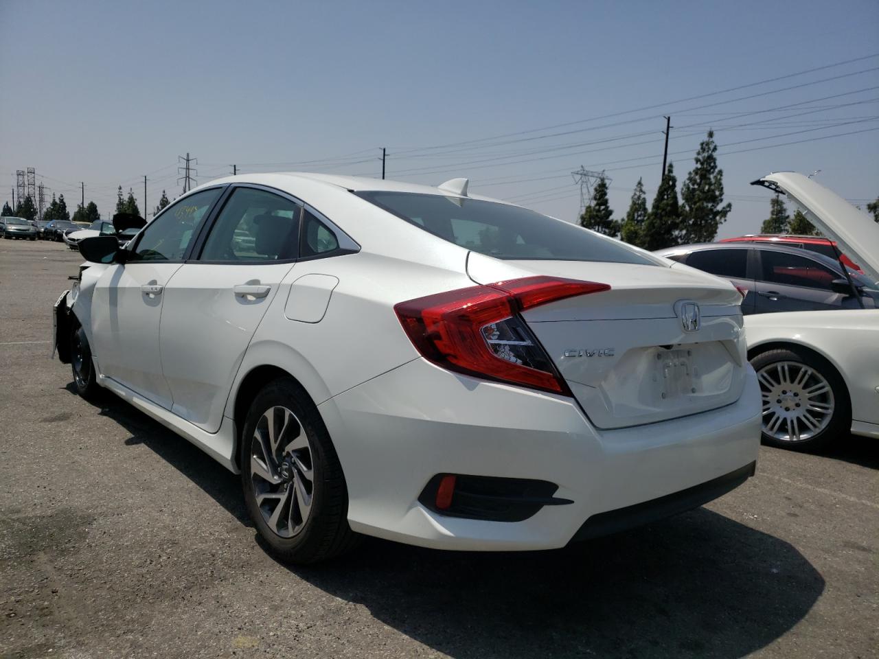 Photo 3 from auction – 2017 HONDA CIVIC EX with VIN 2HGFC2F72HH543389