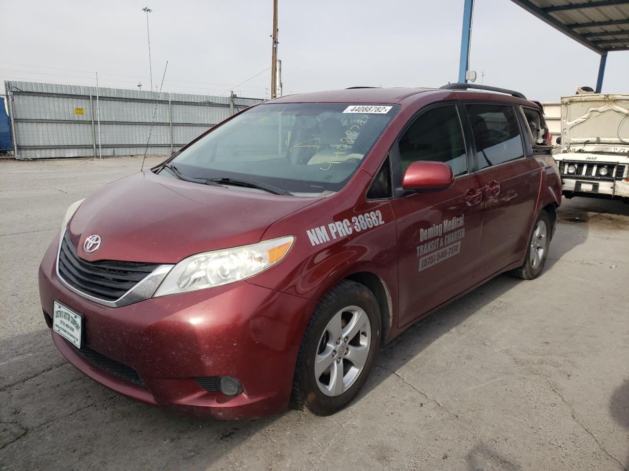Photo 2 from auction – 2014 TOYOTA SIENNA LE with VIN 5TDKK3DC9ES449125