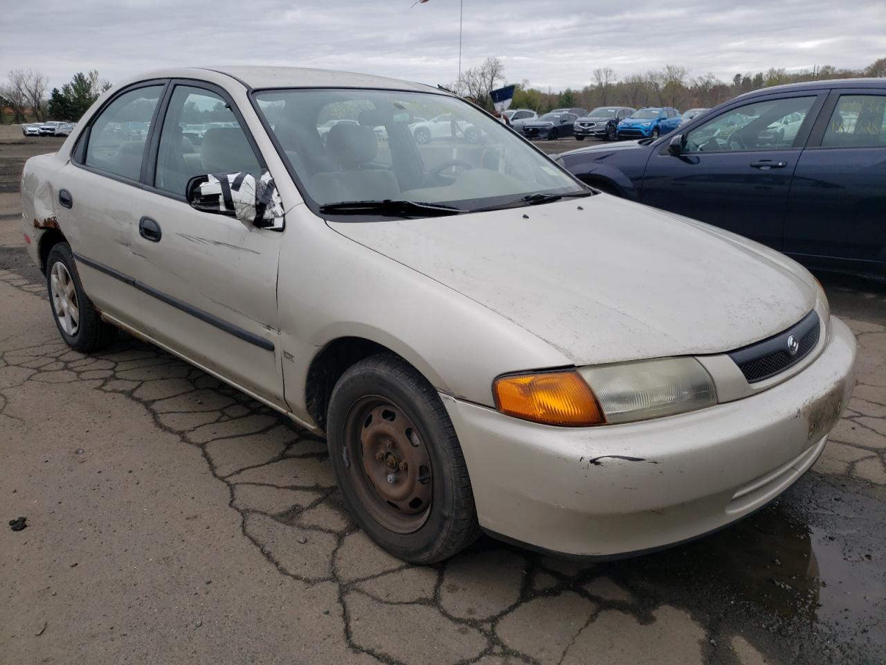 MAZDA PROTEGE DX 1997 with VIN JM1BC141XV0131033 - Photo from auction
