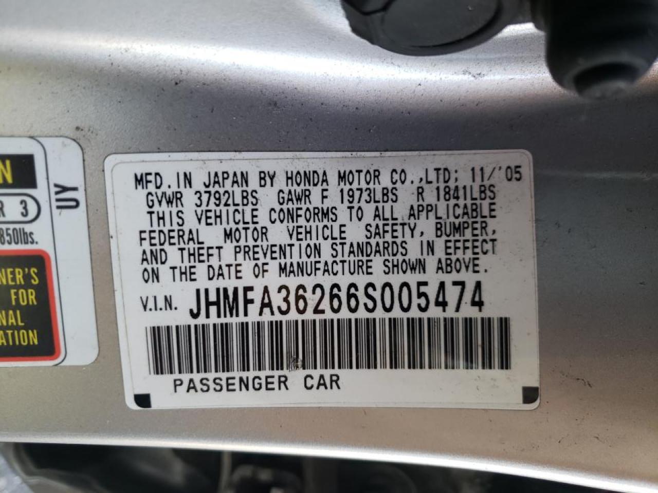 Photo 10 from auction – 2006 HONDA CIVIC HYBR with VIN JHMFA36266S005474