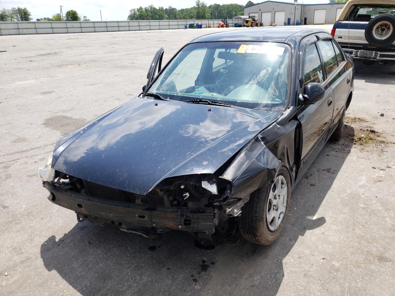 Photo 2 from auction – 2005 HYUNDAI ACCENT GL with VIN KMHCG45C15U660790