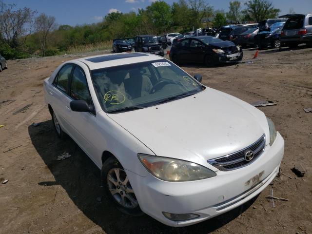 TOYOTA CAMRY LE 2004 with VIN JTDBE32K940284230 - Photo from auction
