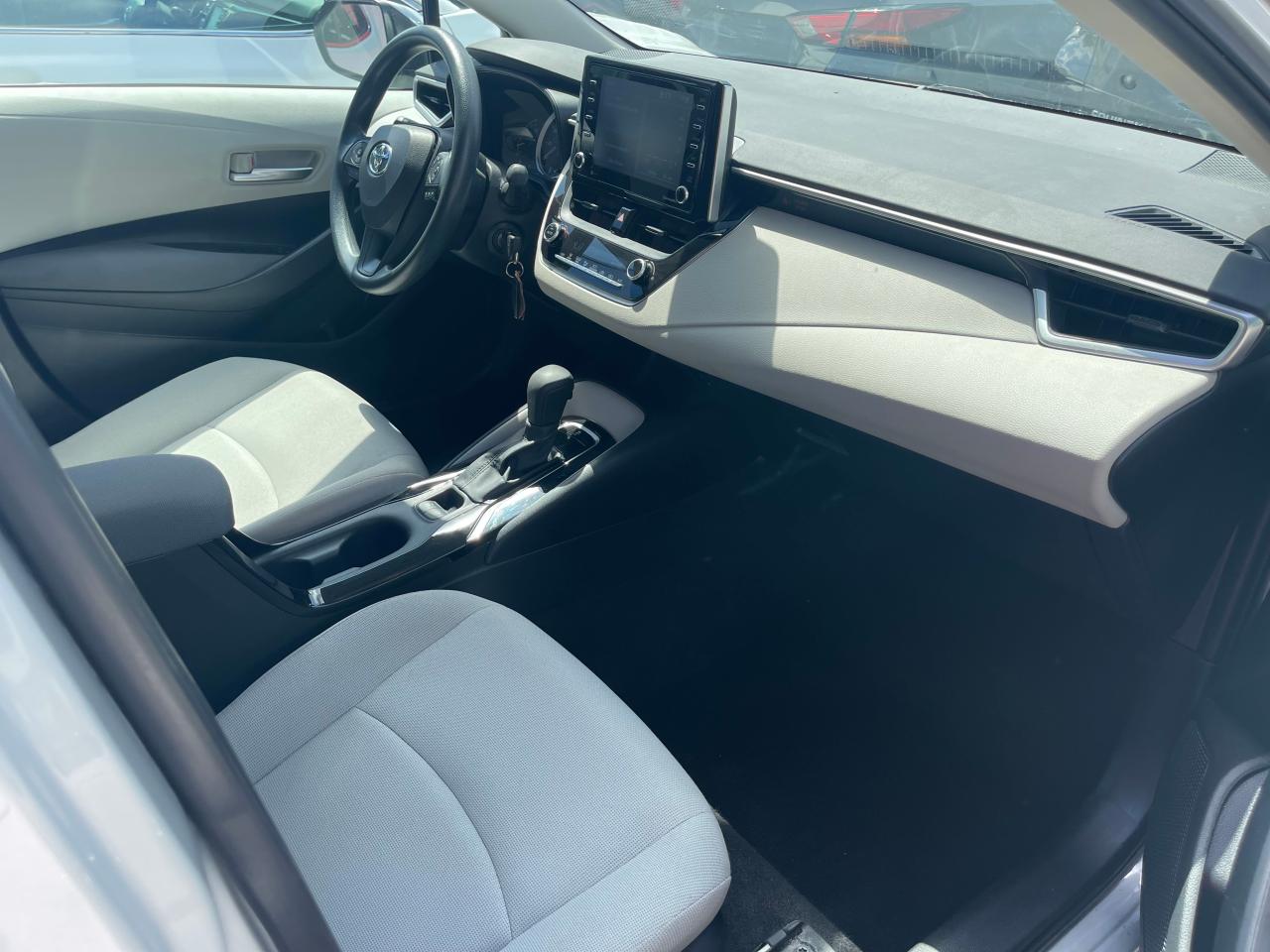Photo 5 from auction – 2021 TOYOTA COROLLA LE with VIN 5YFEPMAE4MP229974