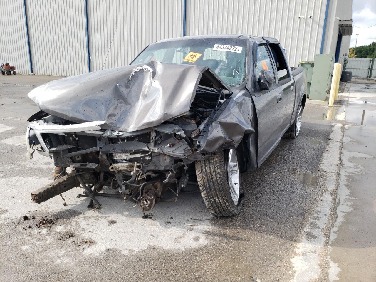 Photo 2 from auction – 2002 FORD F150 SUPER with VIN 1FTRW073X2KC22493