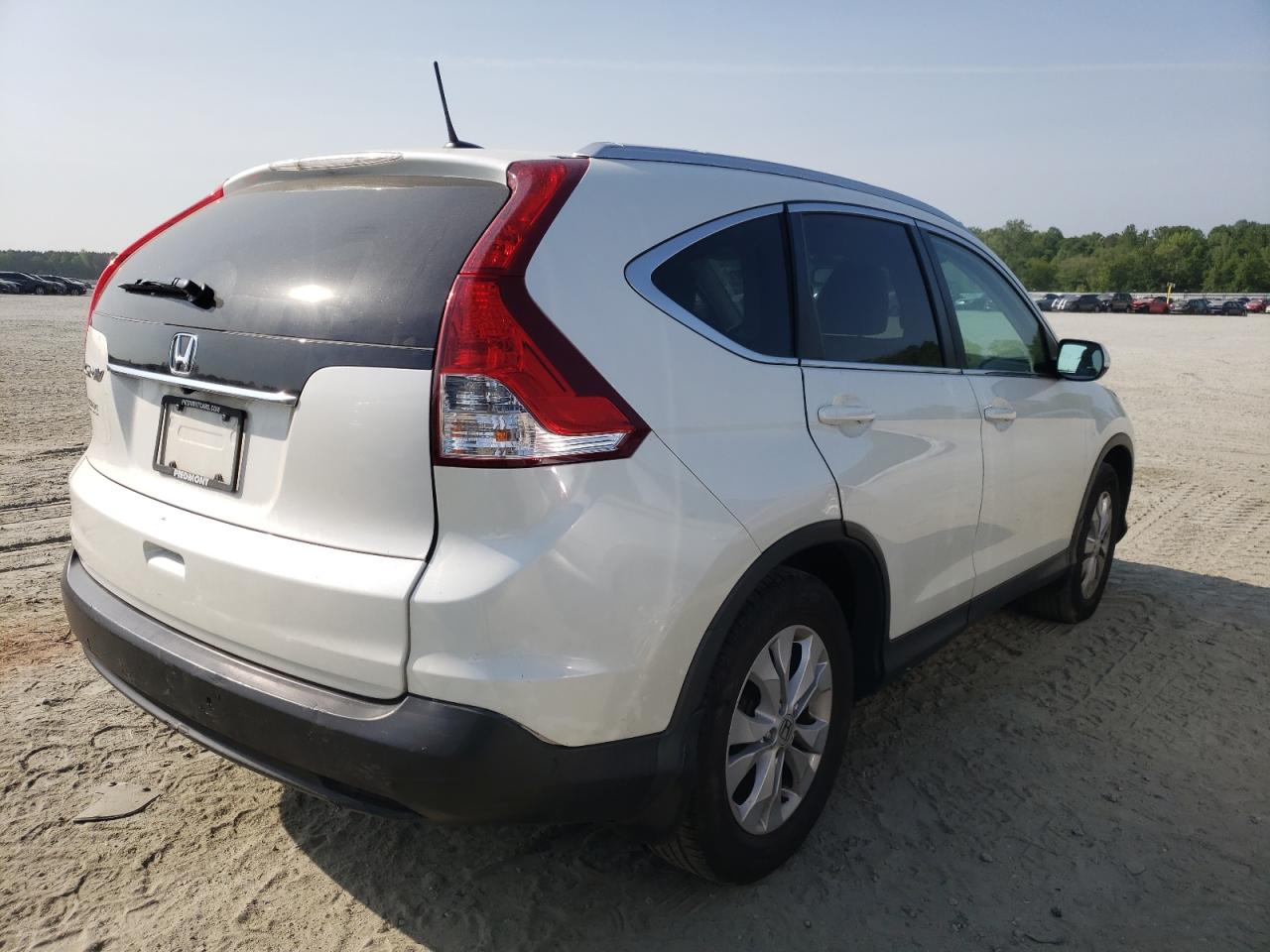 Photo 4 from auction – 2014 HONDA CR-V EXL with VIN 5J6RM3H79EL035313
