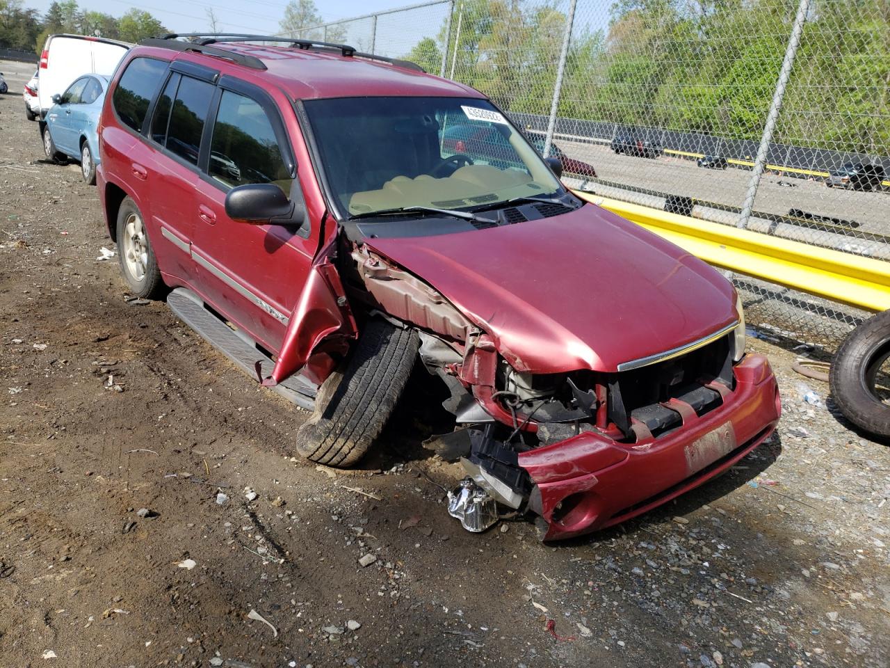GMC ENVOY 2002 with VIN 1GKDT13S822464435 - Photo from auction