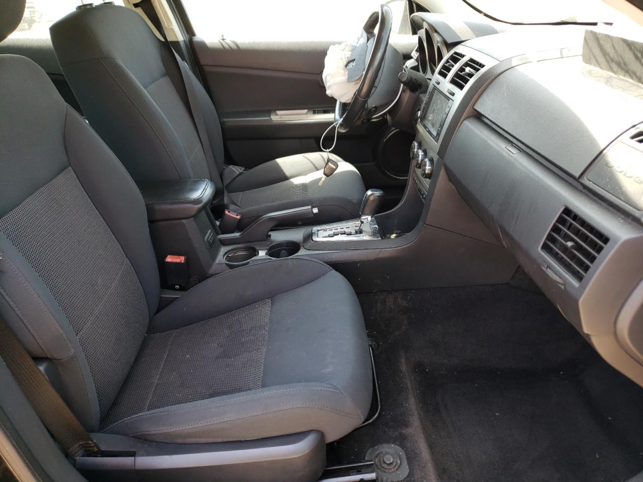 Photo 5 from auction – 2009 DODGE AVENGER SX with VIN 1B3LC56B69N538990