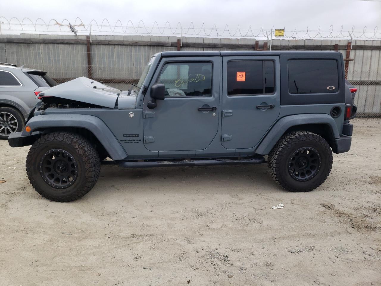 Photo 9 from auction – 2014 JEEP WRANGLER U with VIN 1C4BJWDG3EL312917