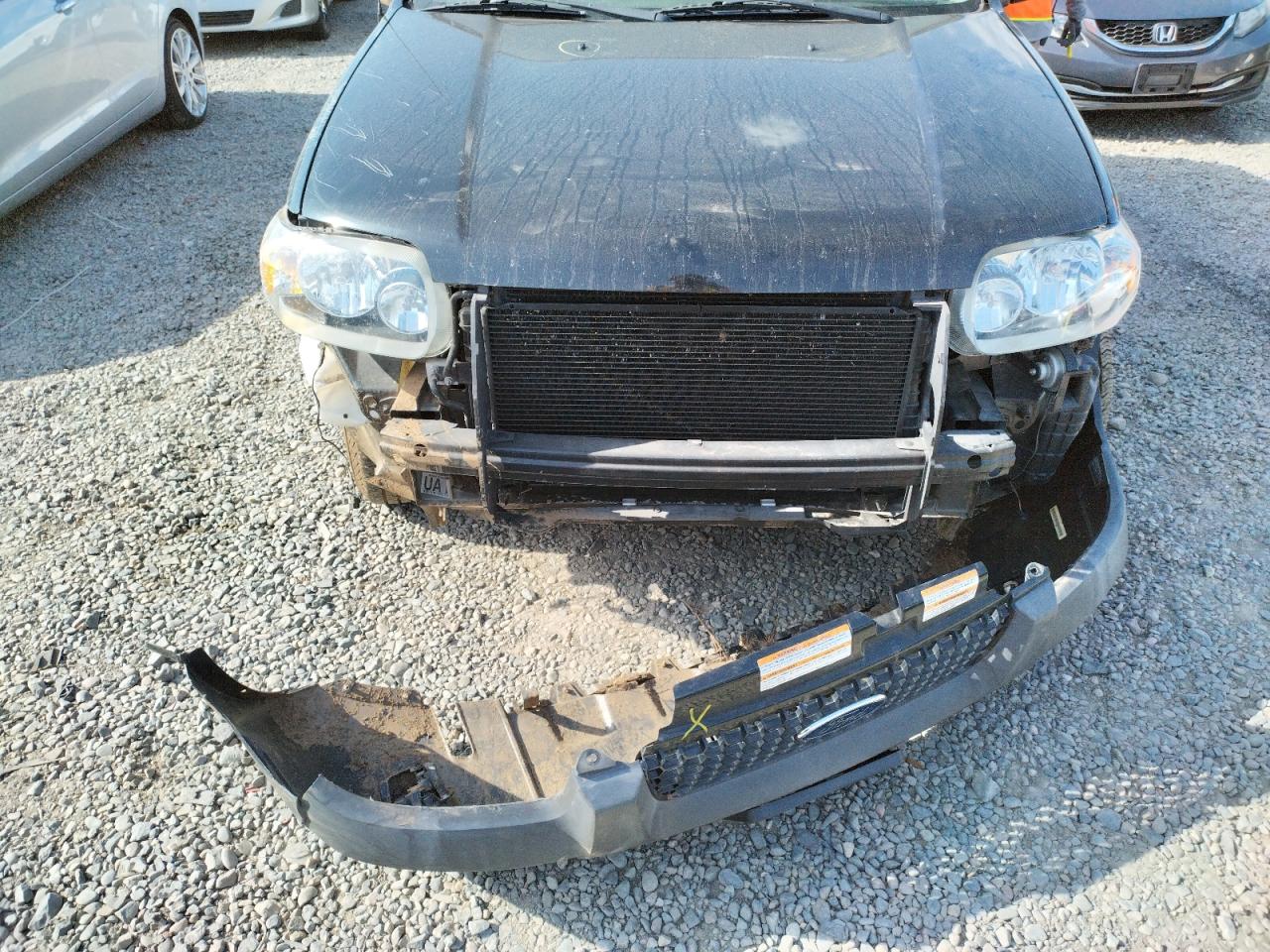 Photo 9 from auction – 2007 FORD ESCAPE HEV with VIN 1FMCU49H97KB51012