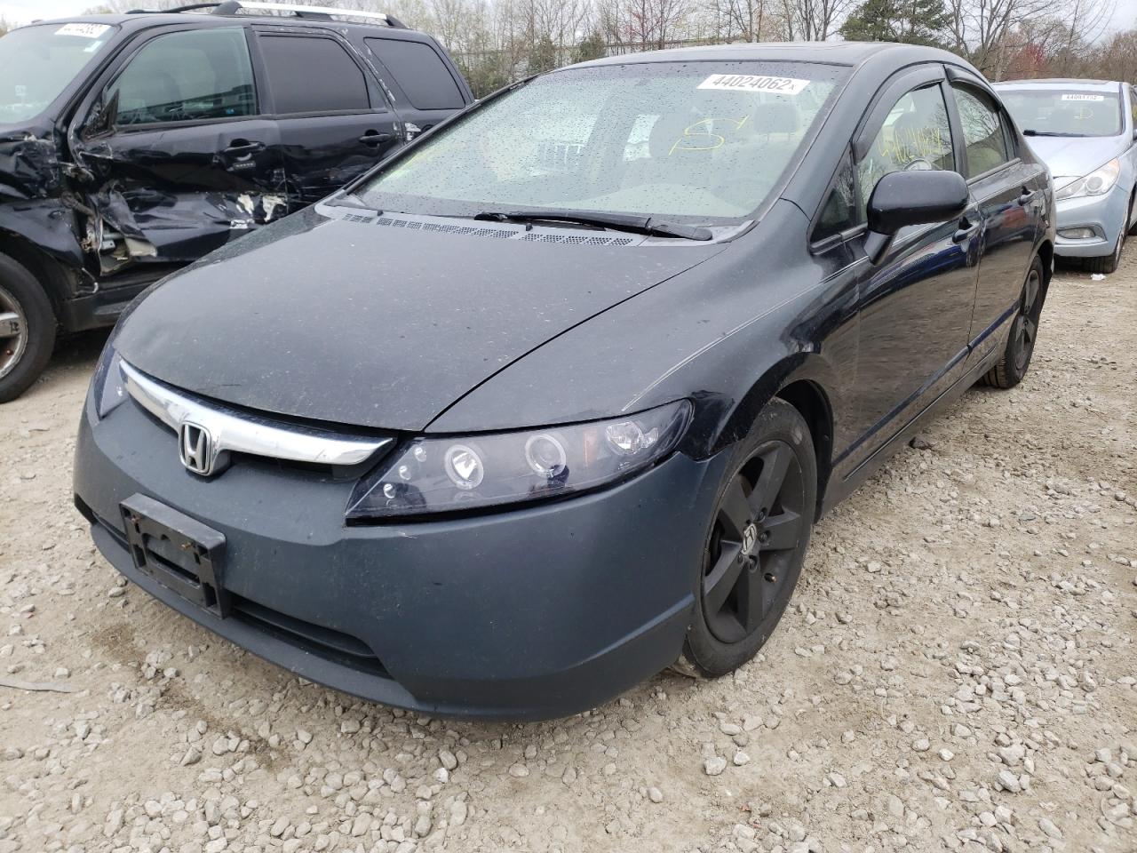 Photo 2 from auction – 2006 HONDA CIVIC EX with VIN JHMFA16896S000732