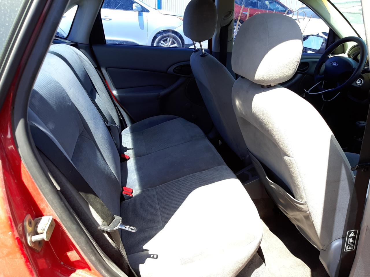 Photo 18 from auction – 2002 FORD FOCUS LX with VIN 1FAFP33P52W141281