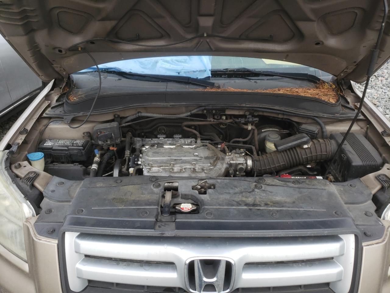 Photo 19 from auction – 2006 HONDA PILOT EX with VIN 5FNYF28466B043241