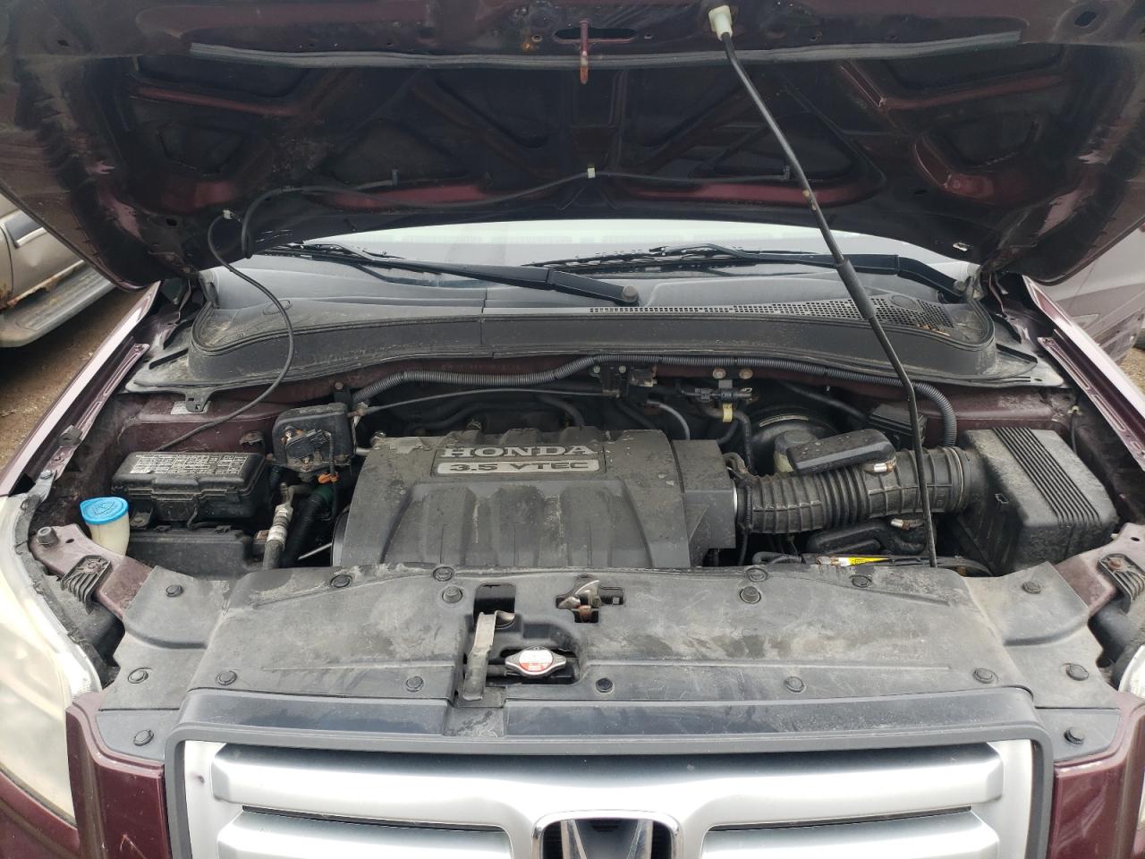 Photo 7 from auction – 2007 HONDA PILOT with VIN 2HKYF18657H512172