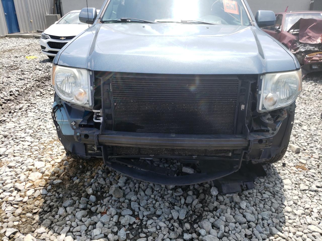 Photo 9 from auction – 2011 FORD ESCAPE LIM with VIN 1FMCU9EG4BKB57125