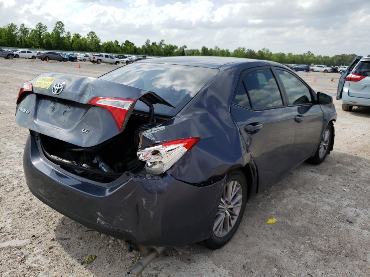 Photo 4 from auction – 2014 TOYOTA COROLLA L with VIN 5YFBURHE3EP019057