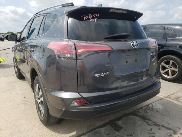 Photo 3 from auction – 2018 TOYOTA RAV4 LE with VIN JTMZFREV5JJ176567
