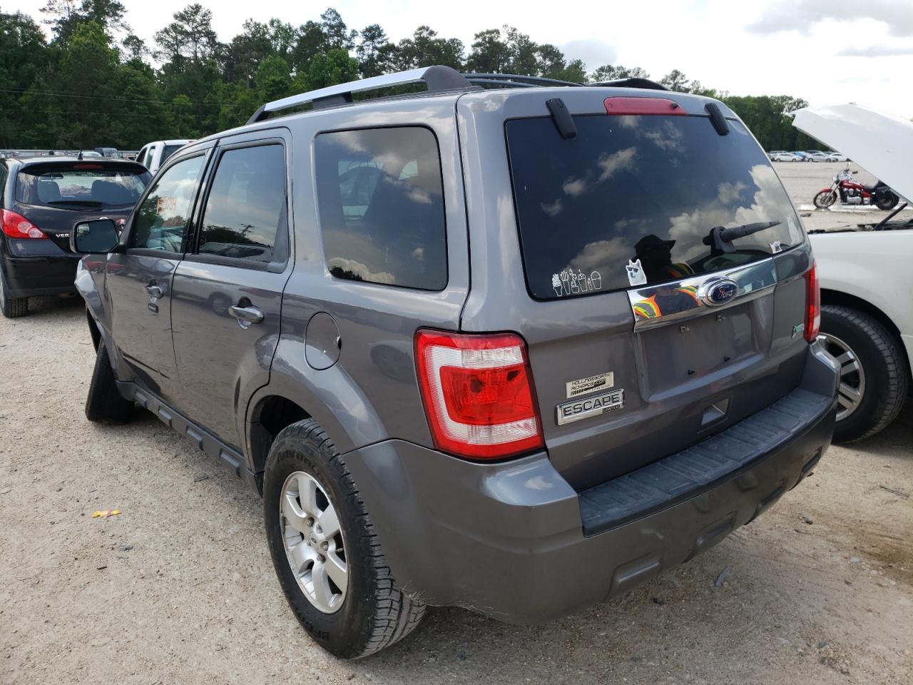 Photo 3 from auction – 2010 FORD ESCAPE LIM with VIN 1FMCU0EG4AKB77692