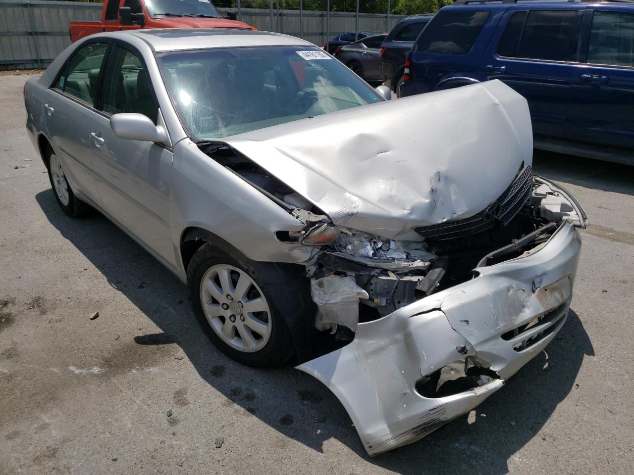 TOYOTA CAMRY LE 2004 with VIN 4T1BF32K84U589753 - Photo from auction