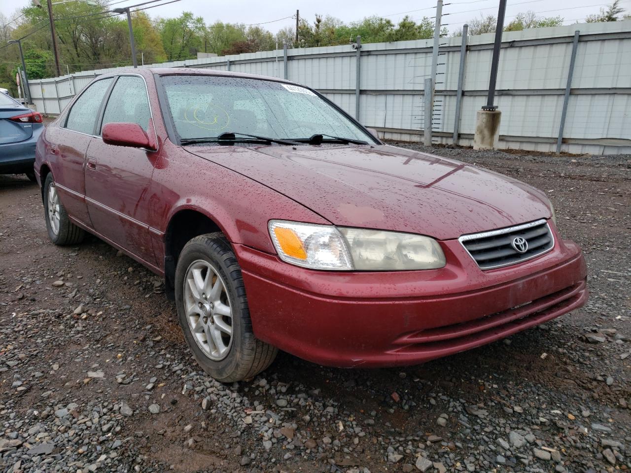 TOYOTA CAMRY LE 2000 with VIN JT2BF28KXY0277669 - Photo from auction