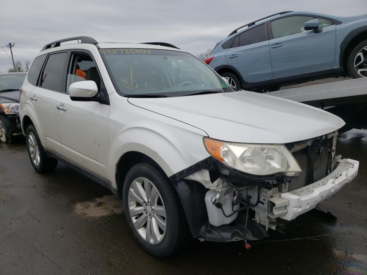 SUBARU FORESTER L 2011 with VIN JF2SHAECXBH707560 - Photo from auction