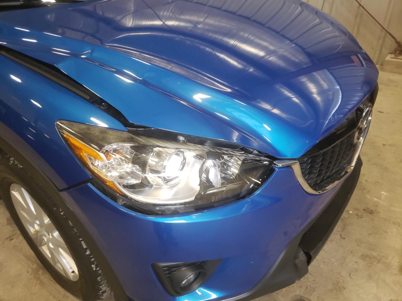 Photo 9 from auction – 2013 MAZDA CX-5 TOURI with VIN JM3KE4CE7D0140200
