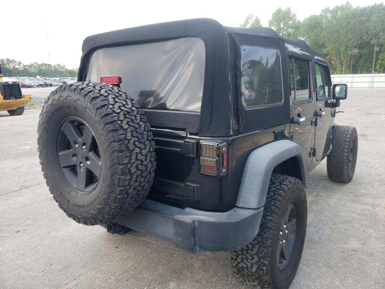 Photo 4 from auction – 2014 JEEP WRANGLER U with VIN 1C4BJWDG6EL282974