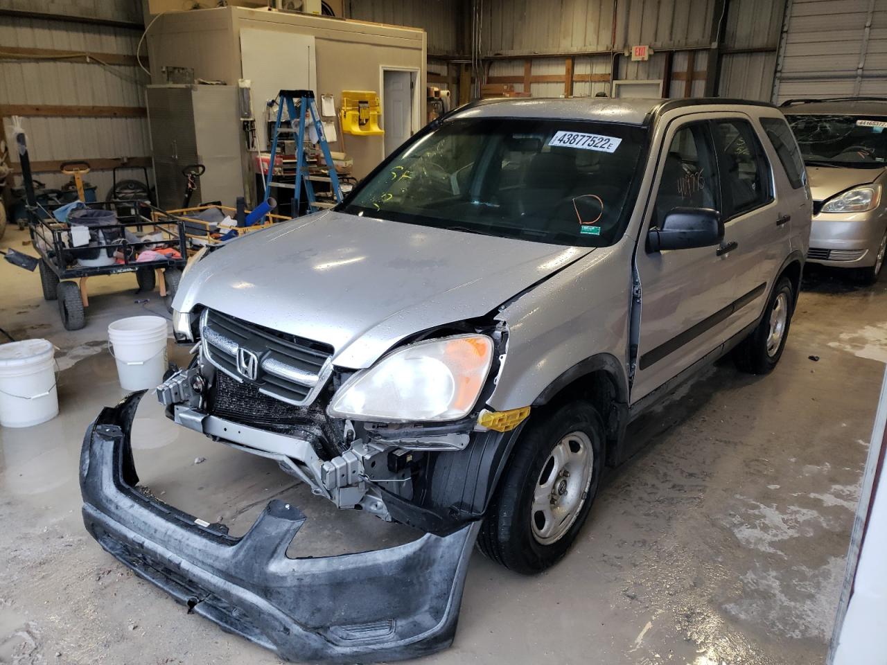 Photo 2 from auction – 2002 HONDA CR-V LX with VIN JHLRD68472C016724