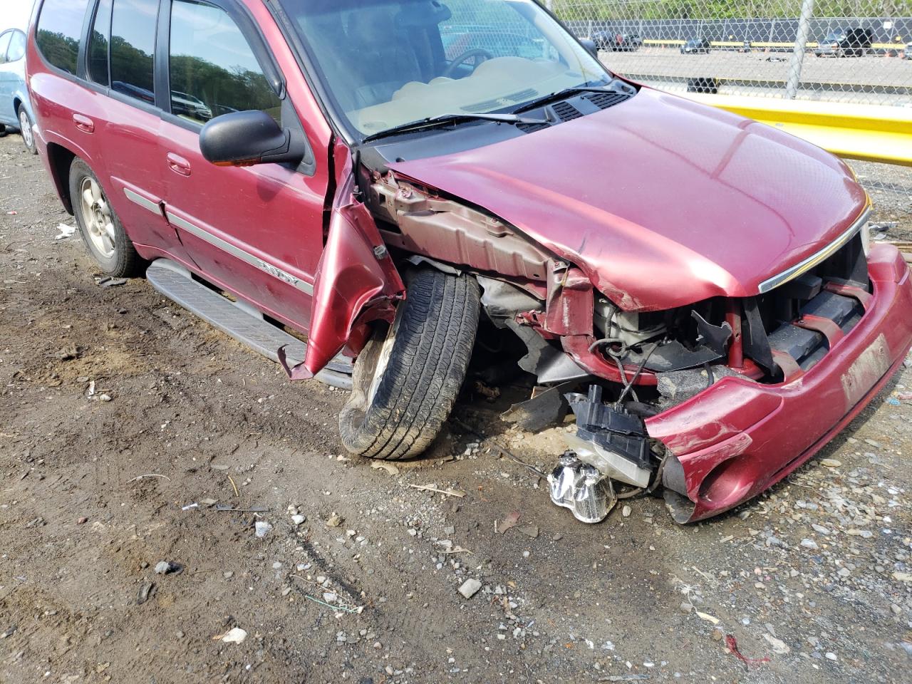 Photo 9 from auction – 2002 GMC ENVOY with VIN 1GKDT13S822464435