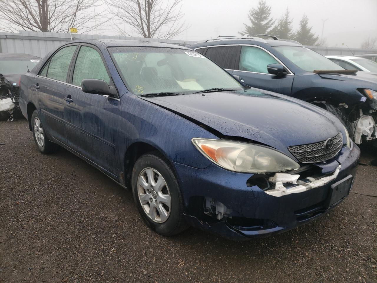 TOYOTA CAMRY LE 2003 with VIN JTDBF32K530120209 - Photo from auction