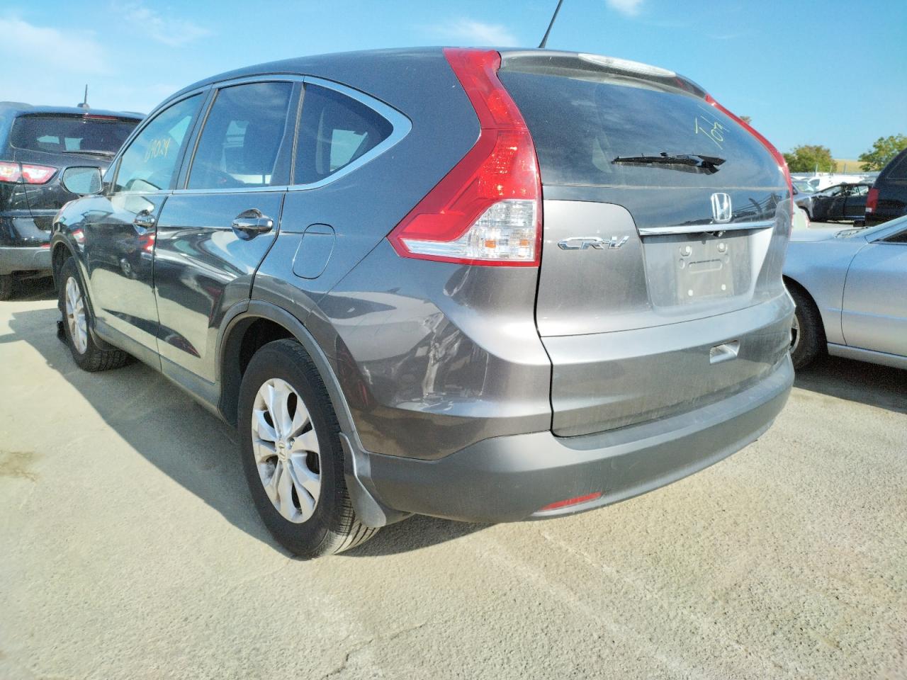 Photo 3 from auction – 2013 HONDA CR-V EX with VIN 2HKRM3H52DH521761