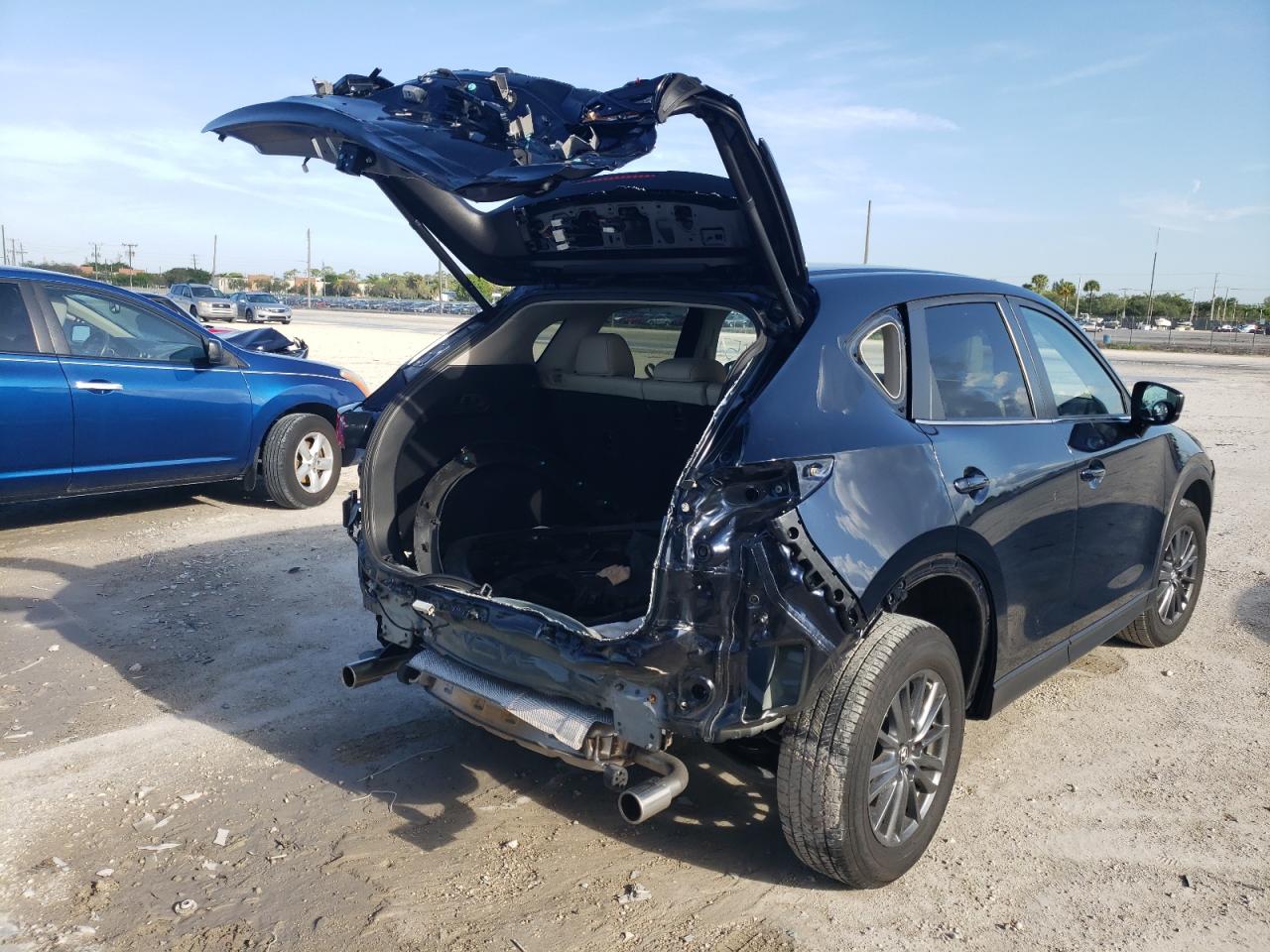 Photo 4 from auction – 2019 MAZDA CX-5 TOURI with VIN JM3KFACM7K0617708