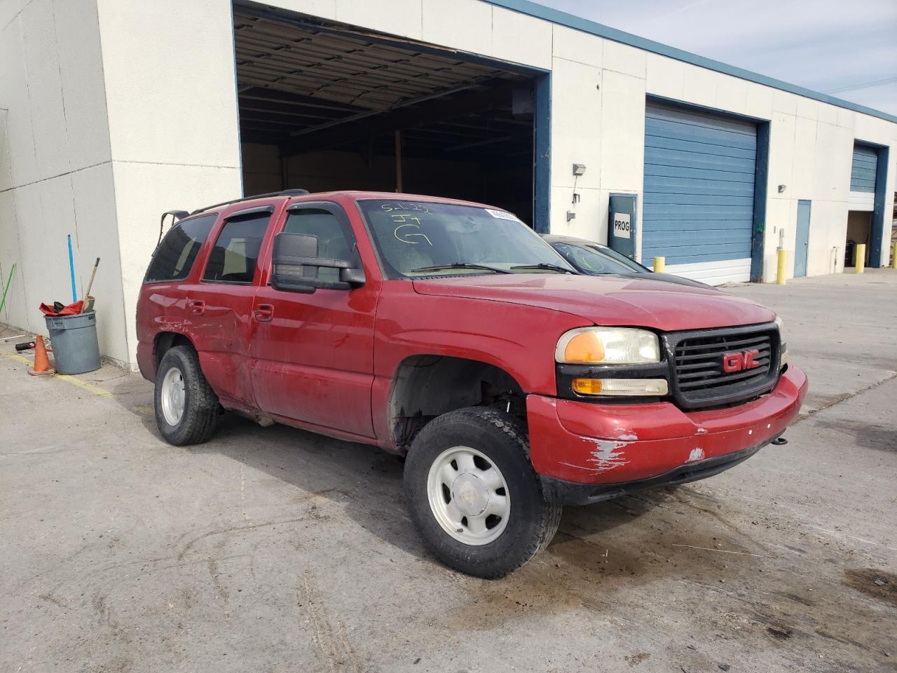 GMC YUKON 2003 with VIN 1GKEC13Z43R154471 - Photo from auction