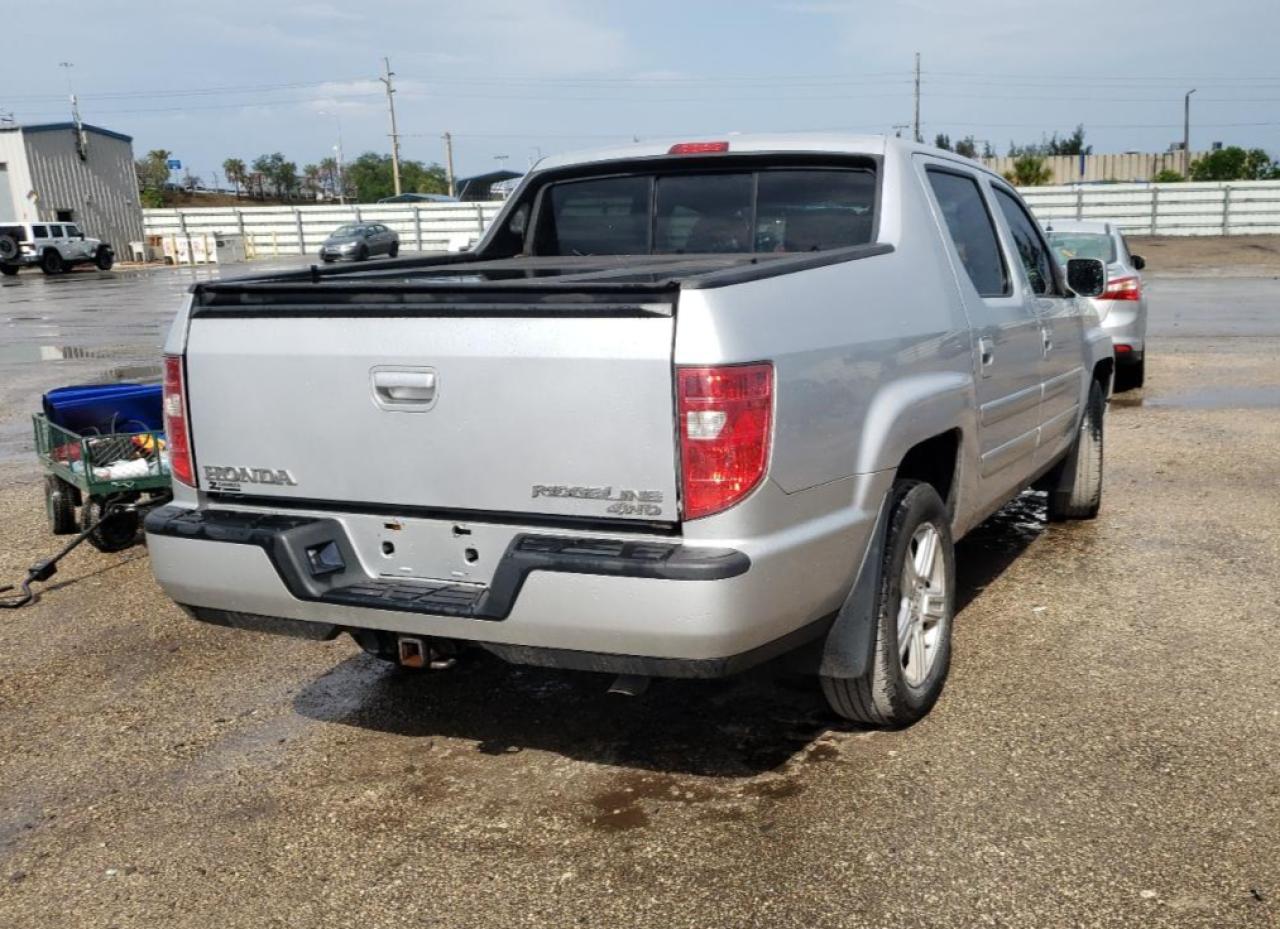 Photo 4 from auction – 2010 HONDA RIDGELINE with VIN 5FPYK1F56AB007759