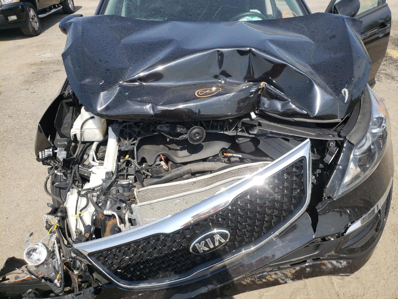 Photo 7 from auction – 2016 KIA SPORTAGE L with VIN KNDPBCAC8G7875895