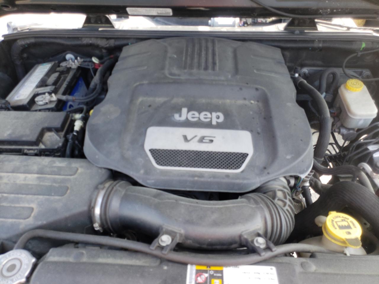 Photo 7 from auction – 2014 JEEP WRANGLER U with VIN 1C4BJWDG6EL282974