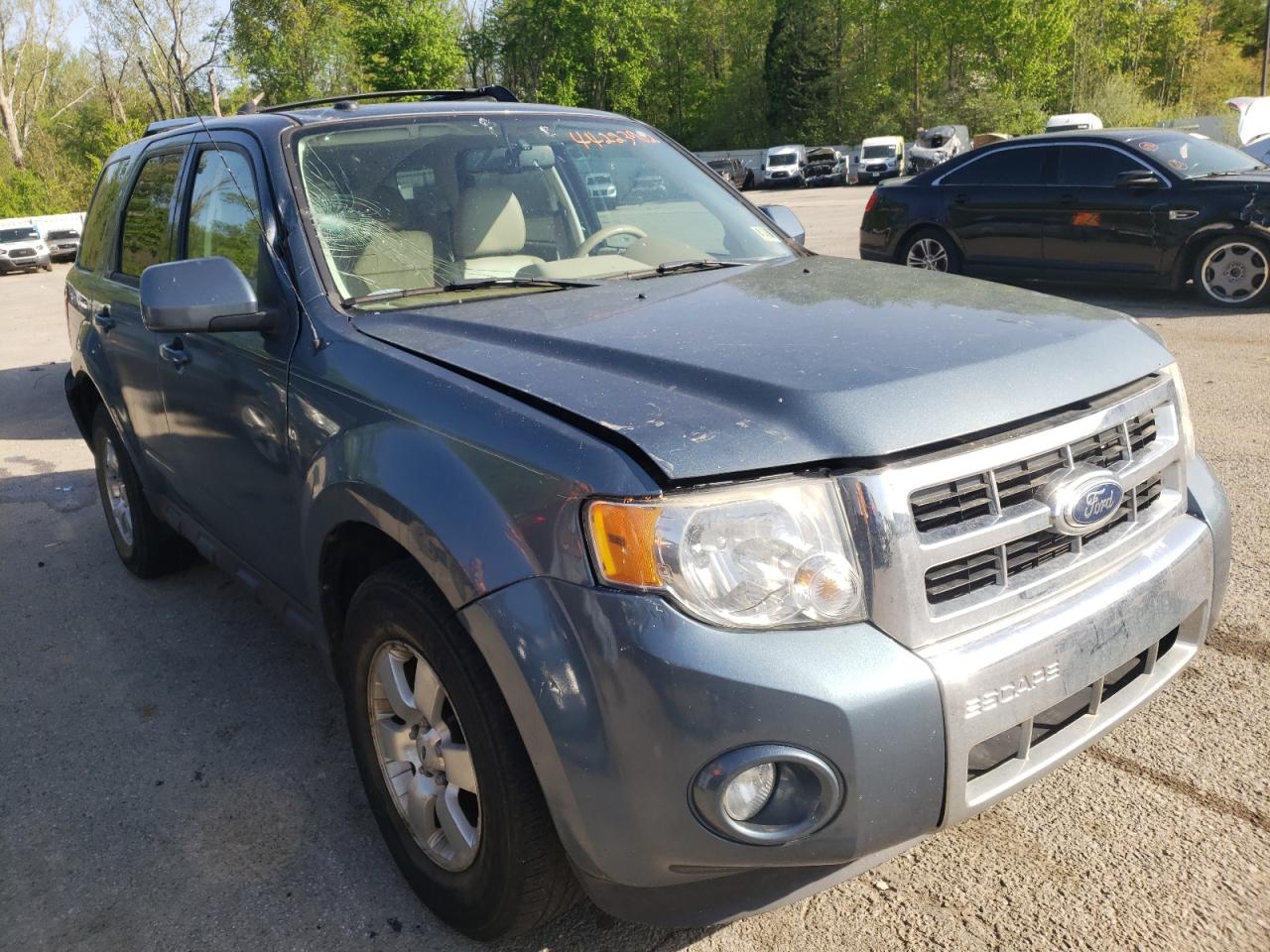FORD ESCAPE LIM 2011 with VIN 1FMCU9EG2BKB57138 - Photo from auction