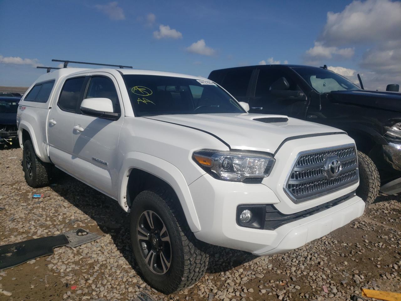 TOYOTA TACOMA 2017 with VIN 3TMDZ5BNXHM013392 - Photo from auction