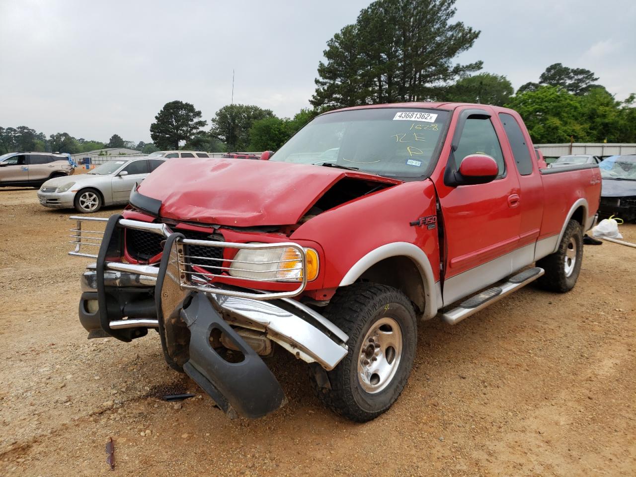 Photo 2 from auction – 2000 FORD F150 with VIN 1FTRX18L6YNA71628