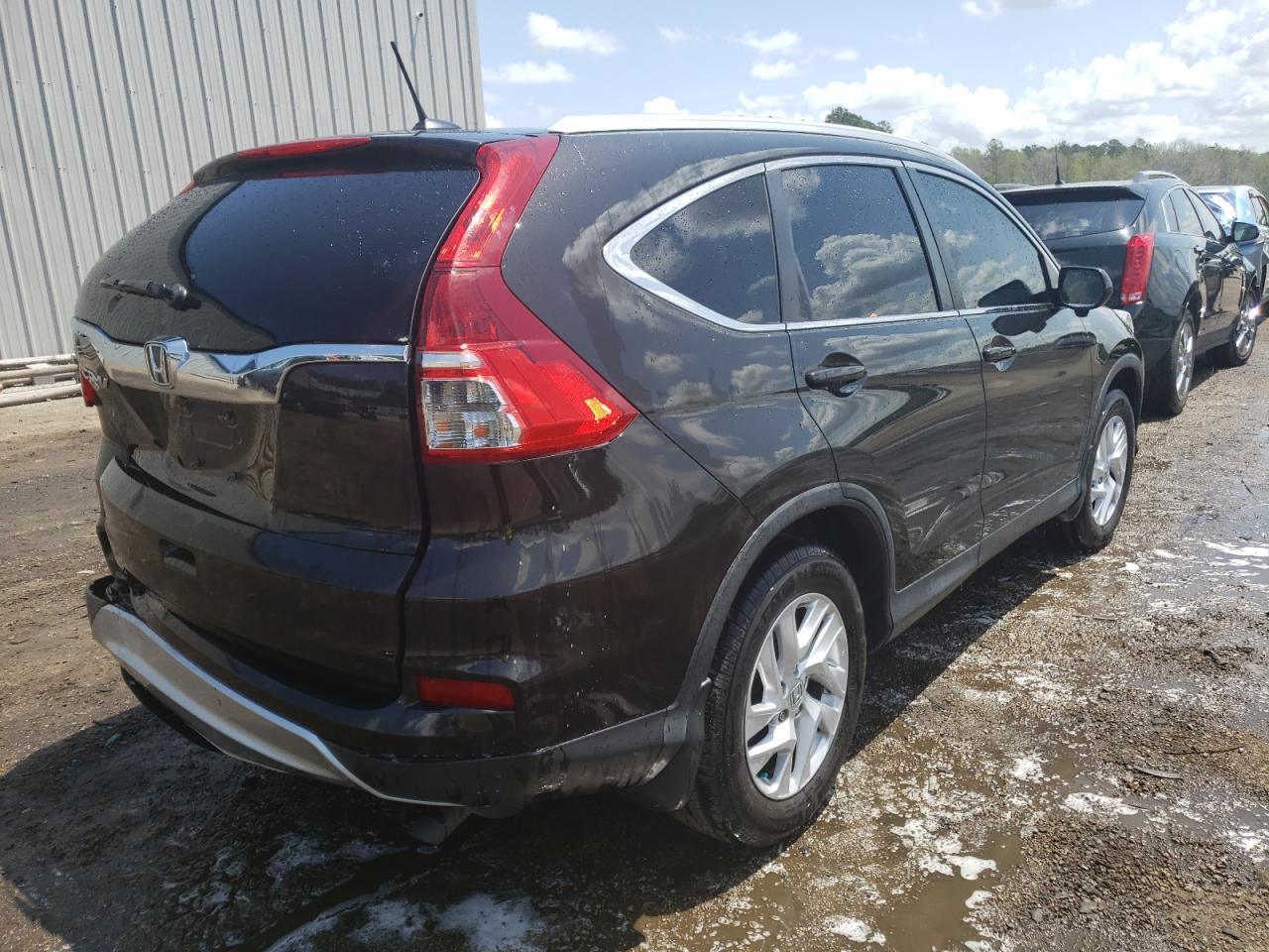 Photo 4 from auction – 2016 HONDA CR-V EXL with VIN 2HKRM3H78GH535430