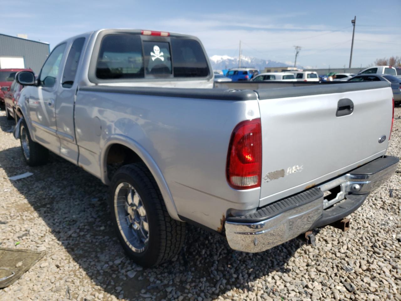 Photo 3 from auction – 1999 FORD F150 with VIN 1FTRX18W3XKA04804