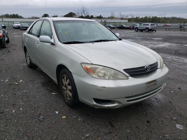 TOYOTA CAMRY LE 2002 with VIN JTDBE30K320118737 - Photo from auction