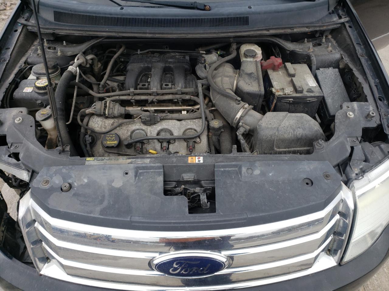 Photo 7 from auction – 2008 FORD TAURUS X S with VIN 1FMDK05W18GA44578
