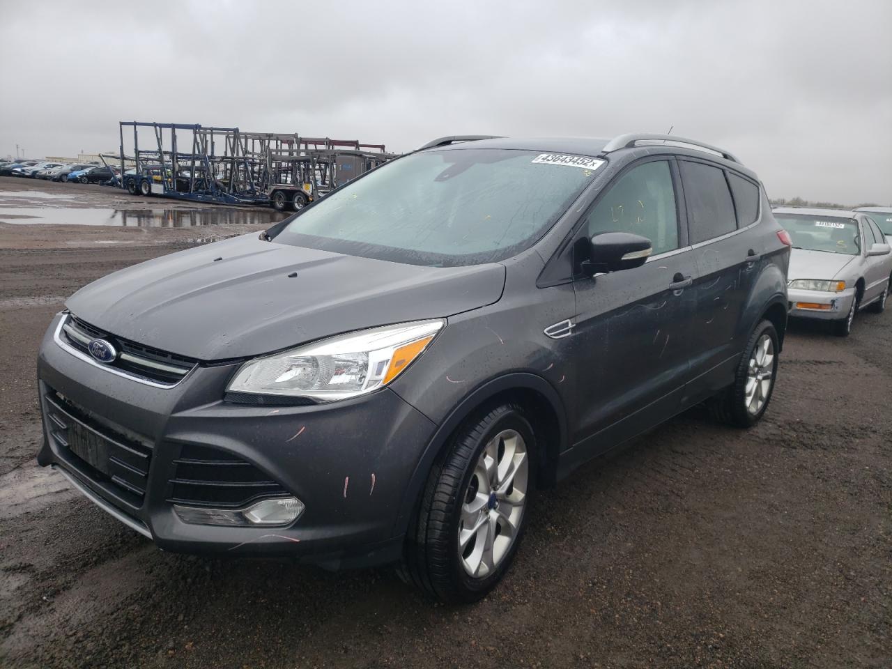 Photo 2 from auction – 2016 FORD ESCAPE TIT with VIN 1FMCU9J92GUC79372