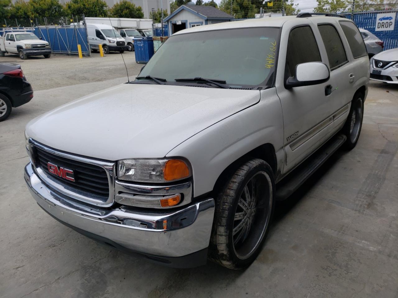 Photo 2 from auction – 2004 GMC YUKON with VIN 1GKEC13V94J312302