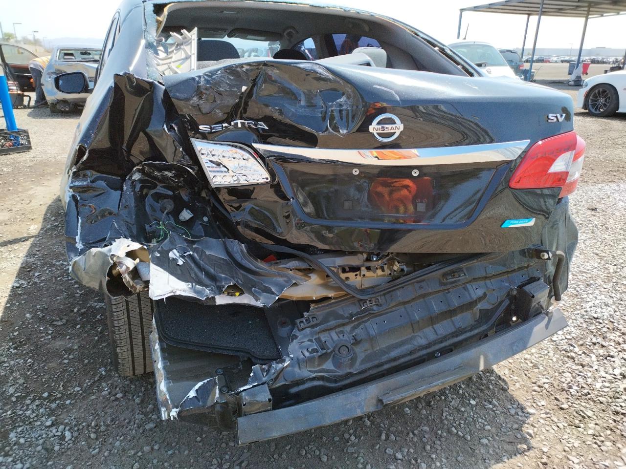 Photo 9 from auction – 2013 NISSAN SENTRA with VIN 1N4AB7AP2DN904532